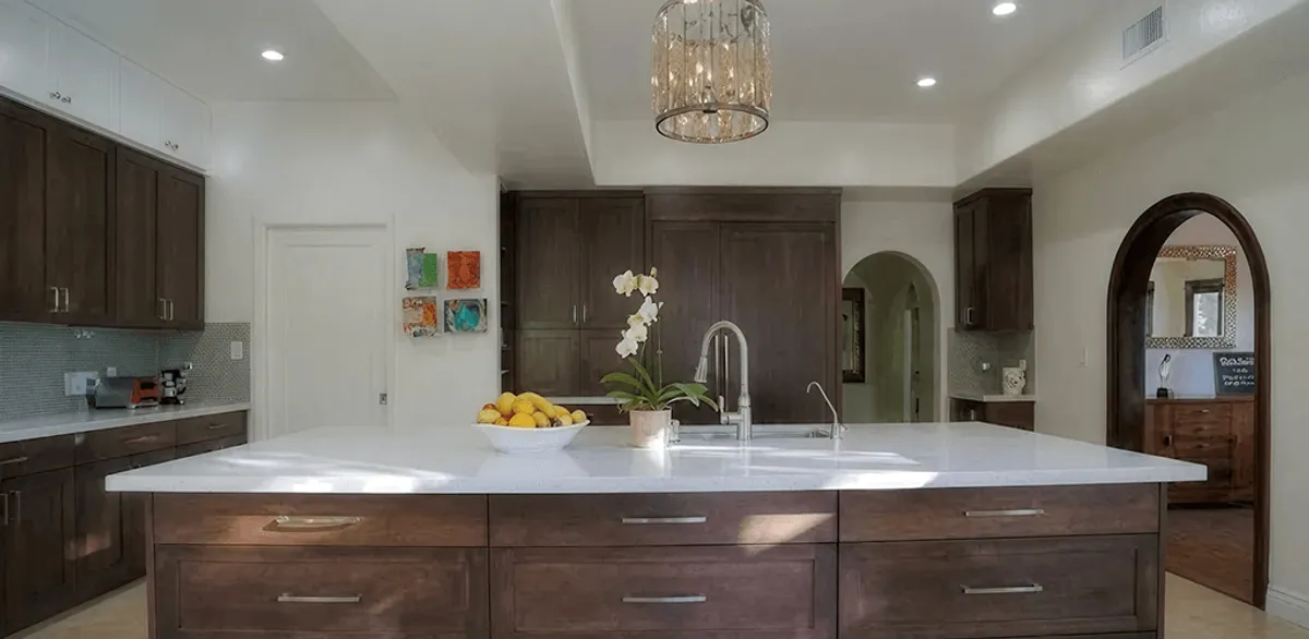 Cabinet refacing project with updated kitchen cabinets and island in Pueblo, CO